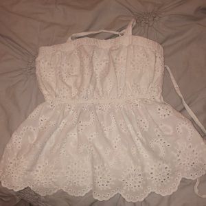 White top that ties on both sides of the shoulders from American Eagle. Small